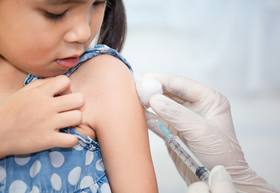 Child being vaccinated